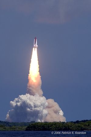 15 seconds into the launch of STS-115, headed out/up over... by Patrick Reardon 