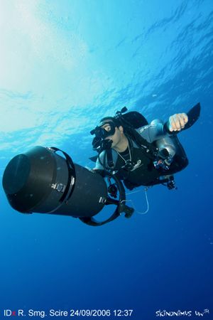 A diver running his gavin scooter in the bay of Haifa. by Skinonimus Uw 