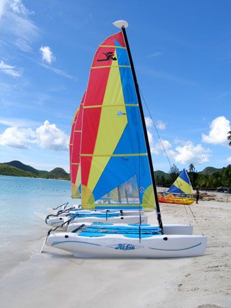 Hobbies chilling on the beach in Antigua by Anna Kinnersly 