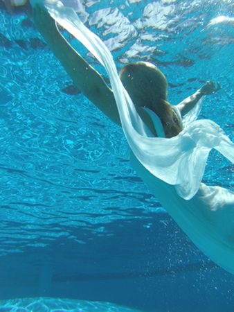 louise is a synchronized swimmer and can control her buoy... by Joanne Doughty 