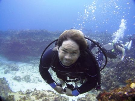 my dive buddy hopes to make a modelling career !!! by Kenn Bolbjerg 