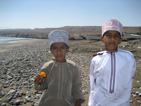 Omani boys at an Omani fishing village. by Ben Nichols 