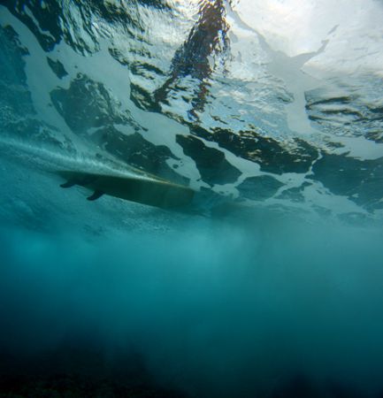 "Below the Wave Rider". Photo taken at Sunset Beach, Nort... by Mathew Cook 
