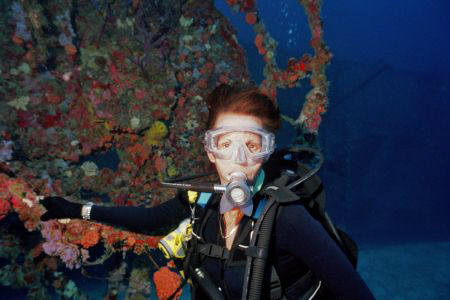 Pam on the Bibb Wreck ( crows nest )  The Bibb lays on he... by Michael Salcito 