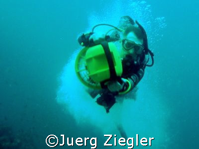 Diver using DPV at full speed... it's a joyride

Thaila... by Juerg Ziegler 