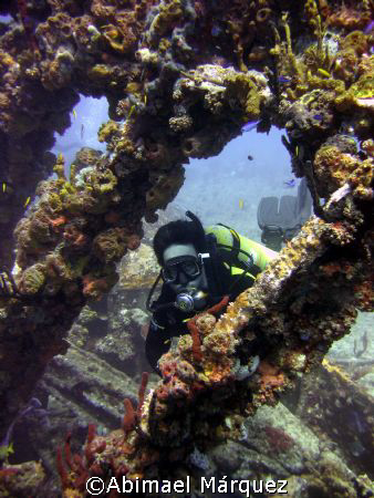 Paco in the RMS Rhone, Salt Island, British Virgin Island. by Abimael Márquez 