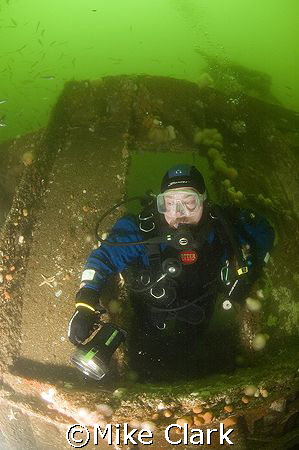 Diver exits Unity wreck.
Moray Firth 
Scotland
nikon d... by Mike Clark 