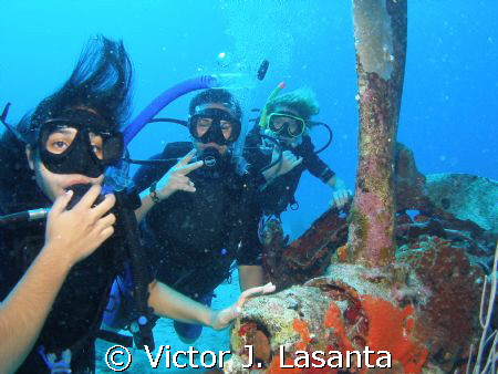 My Jr. Open Water Divers making their first dive on a B-2... by Victor J. Lasanta 