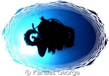 Transparent encounters-diver and jellyfish by Karelas George 