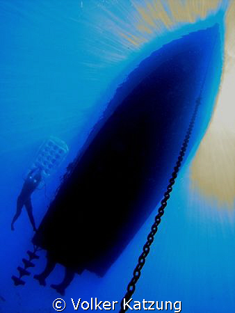 swimmer next to our boat by Volker Katzung 