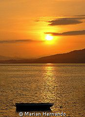 Early morning in Bunaken island at 6am while preparing fo... by Marian Hernando 