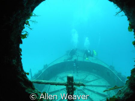 looking through the wheelhouse window at the forward gun ... by Allen Weaver 
