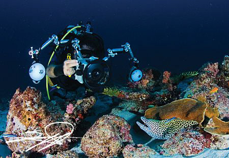 Photographer at work. by Nicholas Samaras 
