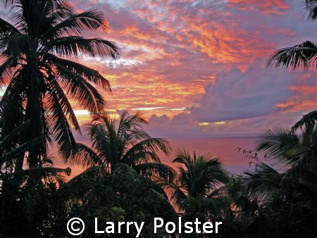 Sunset over the Somosomo Straits of Taveuni by Larry Polster 