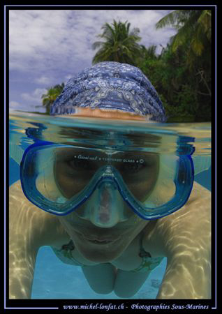 Half-half - Maldives Island / my wife :O) ........ by Michel Lonfat 