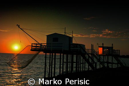 Fishing huts on the West Coast of France. by Marko Perisic 