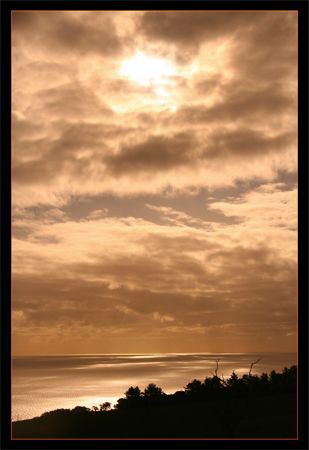 South Australia Sunset.  Used sunglasses as a filter. by Stephen Holinski 