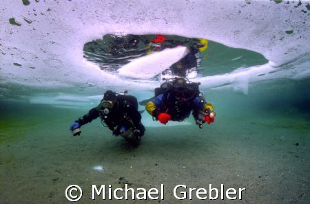 Ice Divers using cave techniques at the start of their di... by Michael Grebler 