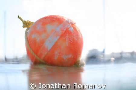 This photo is called "CALM BUOY " by Jonathan Romanov 