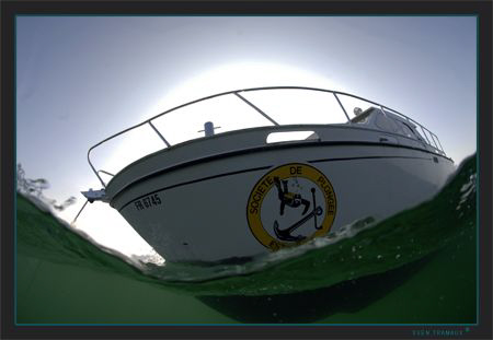 The diving club's boat in the waves. by Sven Tramaux 