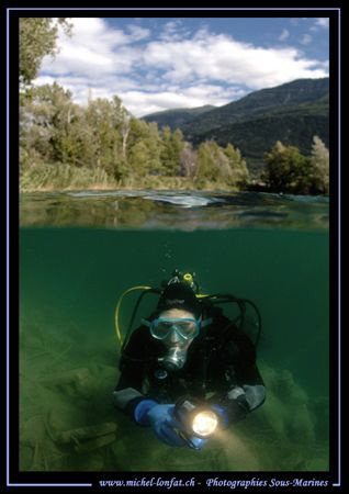 Small artificial lake not far from home... My wife at the... by Michel Lonfat 