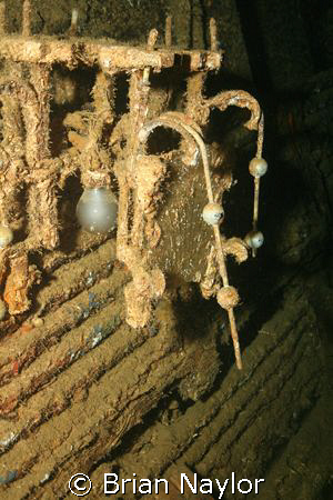 wall chandelier on the US Coolidge in Vanuatu by Brian Naylor 
