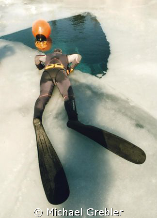 An apnea diver contemplates what he is about to do. Morri... by Michael Grebler 