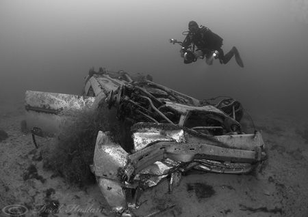 Mark with car wreck. Capernwray. D200, 10.5mm. by Derek Haslam 