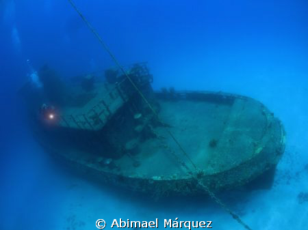 Evelio Pina at Butler Bay wrecks Site. by Abimael Márquez 