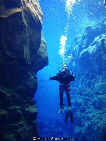 This is my Brother Svanur in the Canyon "Silfra" in "Thin... by Hilmar Sævarsson 