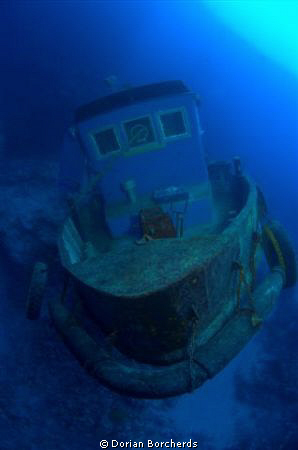 The Apel,a Malasian Logging company's tug boat that got c... by Dorian Borcherds 