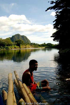 Taken while on a bamboo raft floating down the river. by Karen Dillabough 