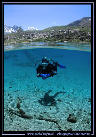 Mountain lake diving with my wife Caroline. Long and Hard... by Michel Lonfat 