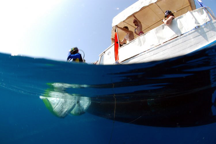 My 13 year old niece enters from the boat. by Andy Kutsch 
