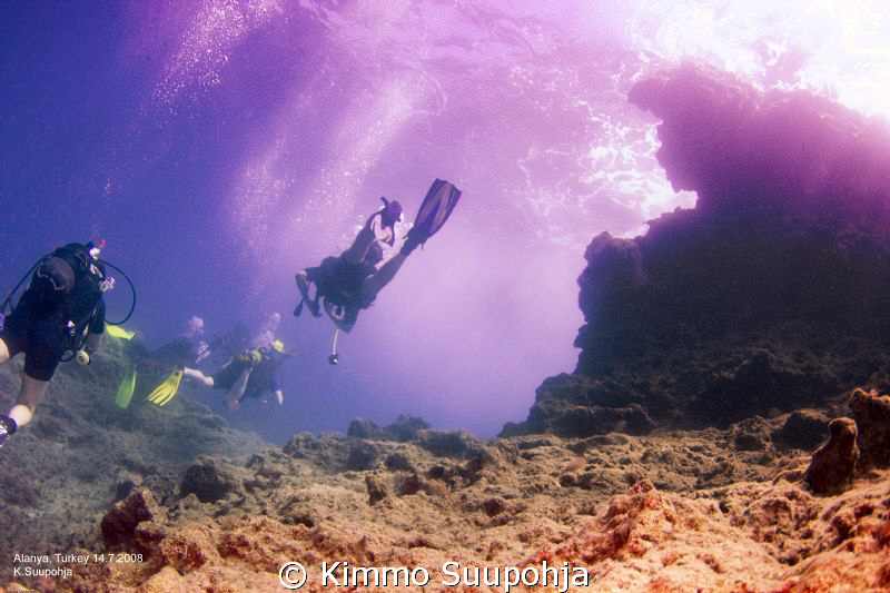 Underwater sunset by Kimmo Suupohja 