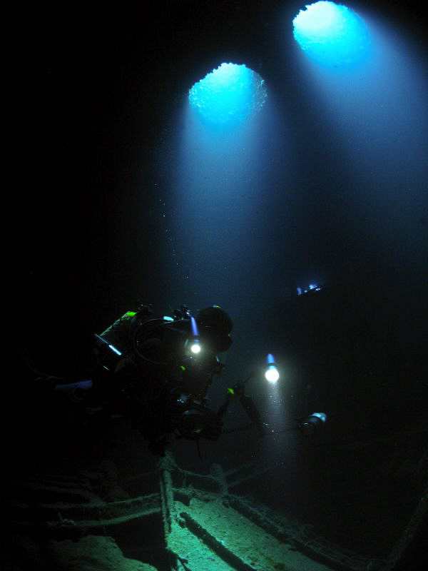 My friend Carlos inside the wreck of the WIT Shoal.  No s... by Juan Torres 