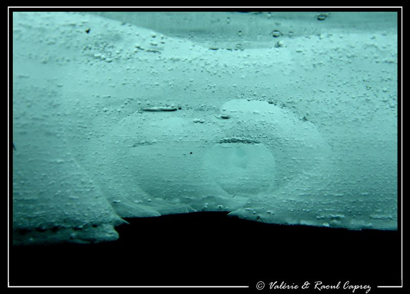 Ice tube under the surface of the Lioson Lake. 4°C (39,2°... by Raoul Caprez 