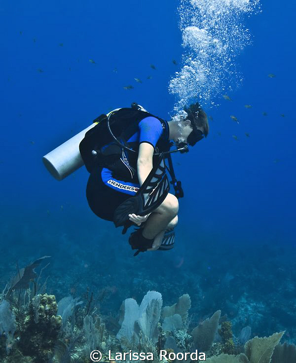 Yoga underwater. by Larissa Roorda 