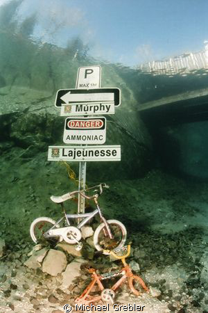 Not a wreck, but this signpost was made underwater in Mor... by Michael Grebler 