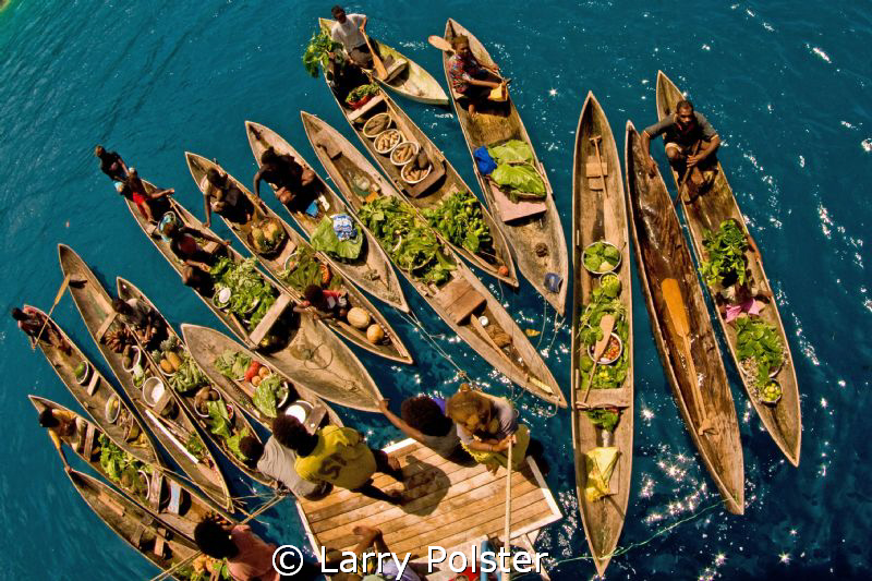 Aboard the Bilikiki , the locals bought the grocery store... by Larry Polster 