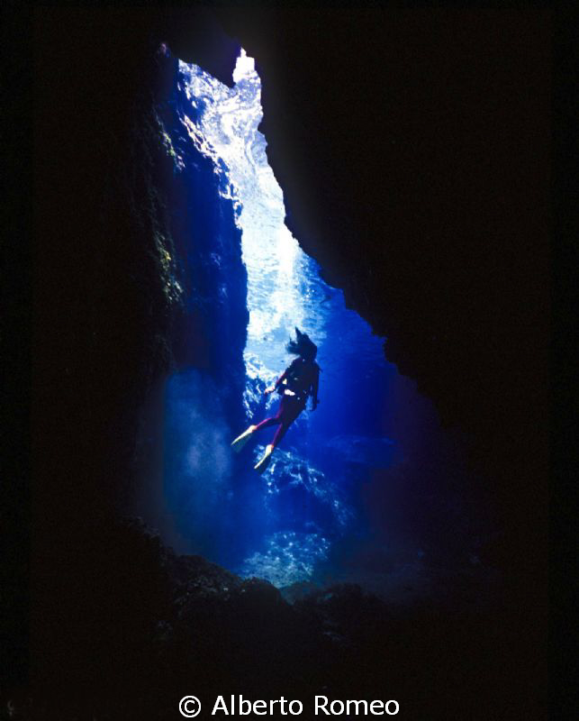 My wife in our "Secret Cave" in Ustica island by Alberto Romeo 