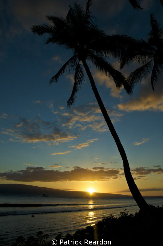 Sunset over Lanai. by Patrick Reardon 