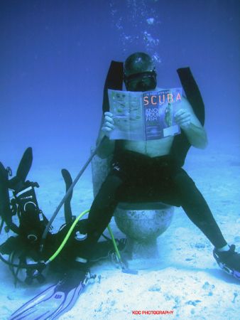 My brother Pete taking time out to take care of business,... by Ken Dean 