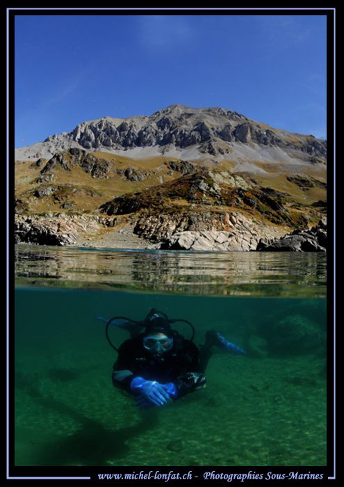 High Altitude Mountain Diving... Caroline my wife in a sm... by Michel Lonfat 