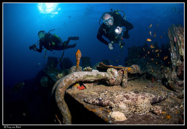 divers on the Thistlegorm by Dray Van Beeck 