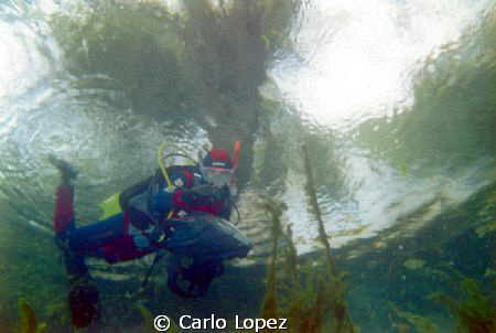 a ride with the scooter in the lake by Carlo Lopez 
