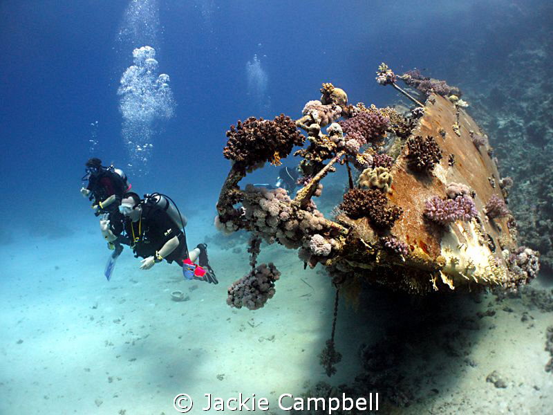 Sunken yacht at small abu galawa. Taken with canon ixus 9... by Jackie Campbell 