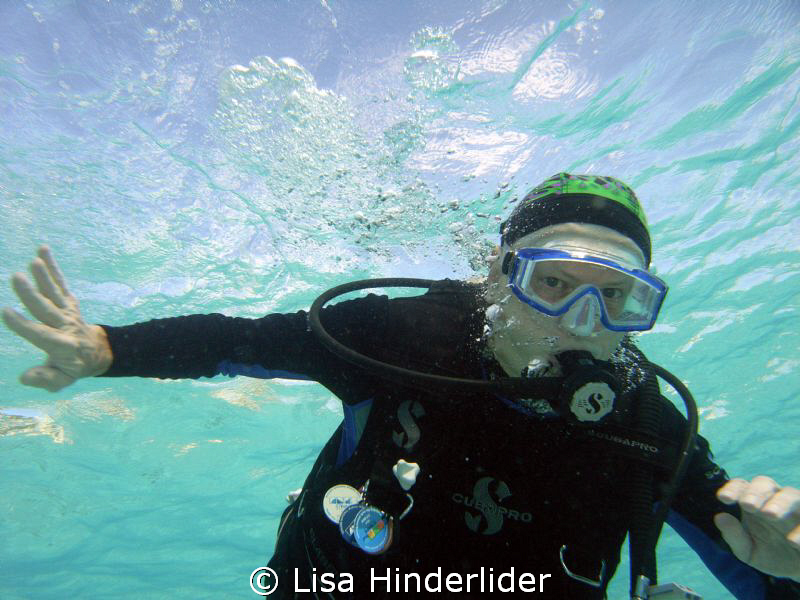"Who dat?" Neil starting his descent on a sunny day! by Lisa Hinderlider 