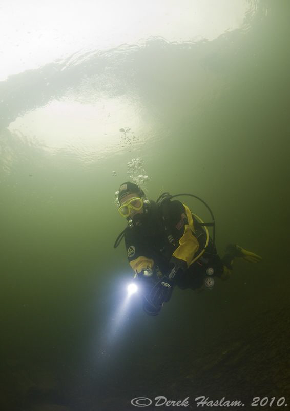 Chris under Devils bridge. River Lune. D3, 16mm. by Derek Haslam 