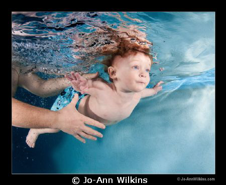 My 16 month son swimming underwater and holding his breath. by Jo-Ann Wilkins 